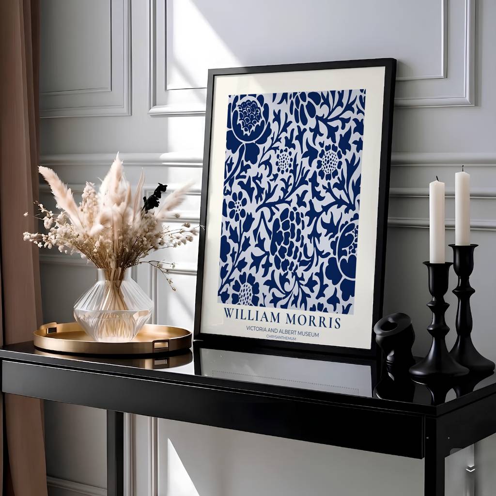 Elegant William Morris floral print capturing an 1877 vintage exhibition design with deep navy blue chrysanthemums on a white background to enhance traditional or modern home interior design.