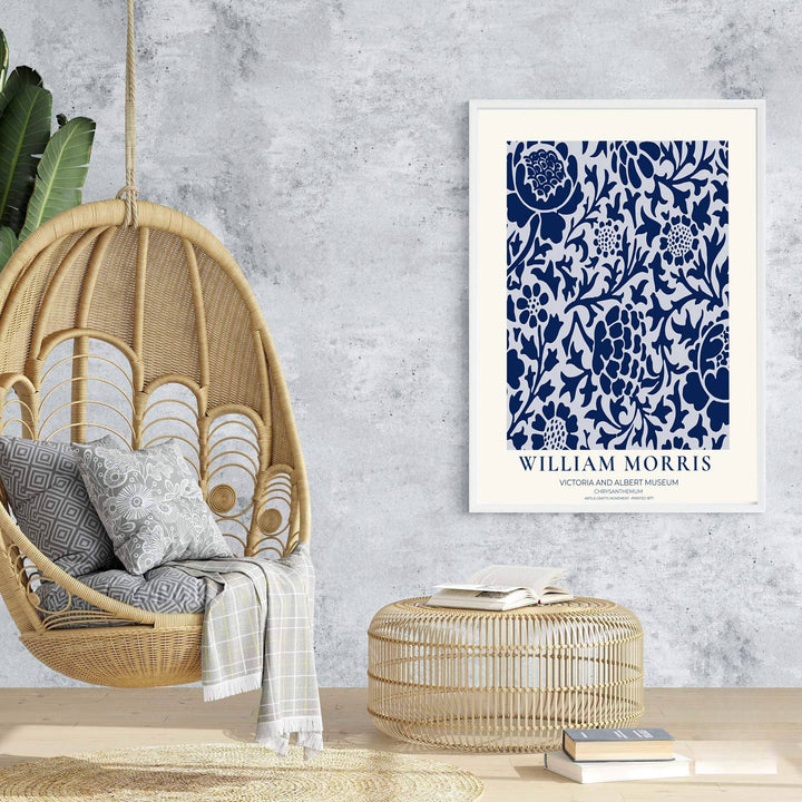 Authentic Arts and Crafts Chrysanthemum design print by William Morris, bringing organic energy, refined English heritage art, and crisp navy blue contrast into cozy home living spaces.
