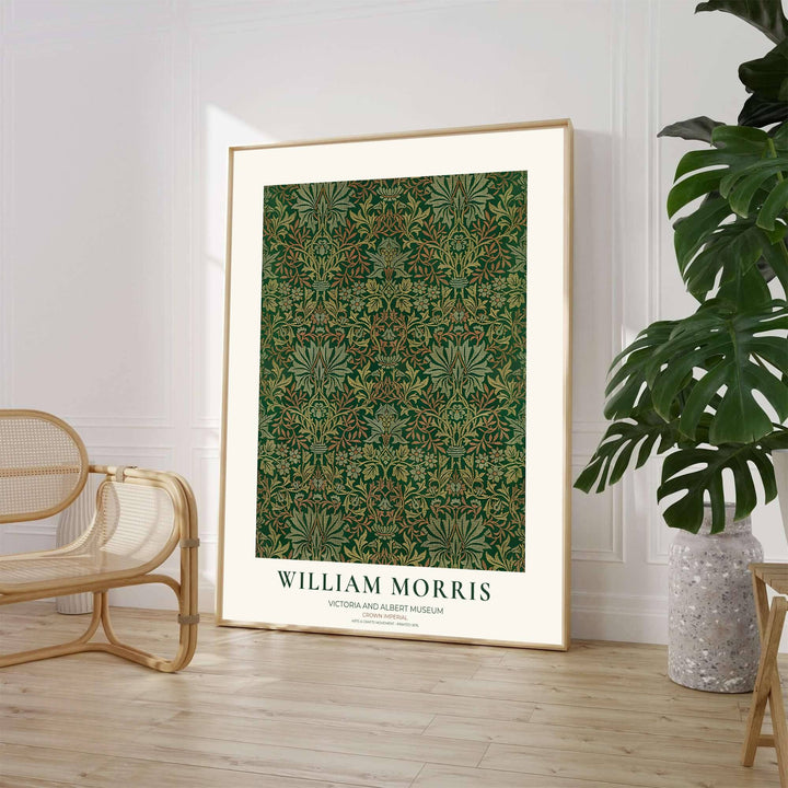 Decorative wall art print of William Morris Crown Imperial dark green poster set against a clean cream margin, bringing timeless vintage British botanical elegance into home interior spaces.