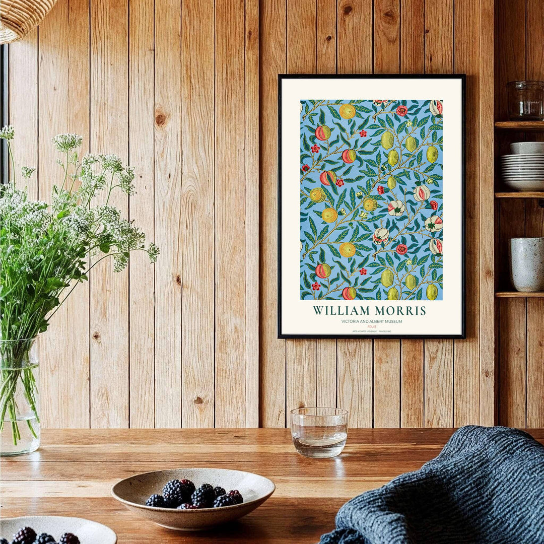 Bountiful fruit pattern artwork featuring ripe pomegranates and lemons on a light blue background, bringing biophilic elegance to contemporary residential interiors.