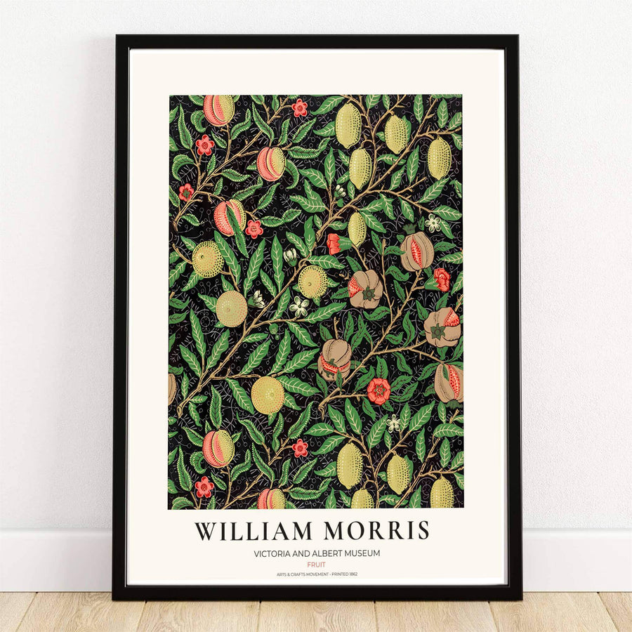 Ripe yellow lemons, blushing peaches, and open pomegranates on a deep black background in a dark academia William Morris Fruit botanical print.