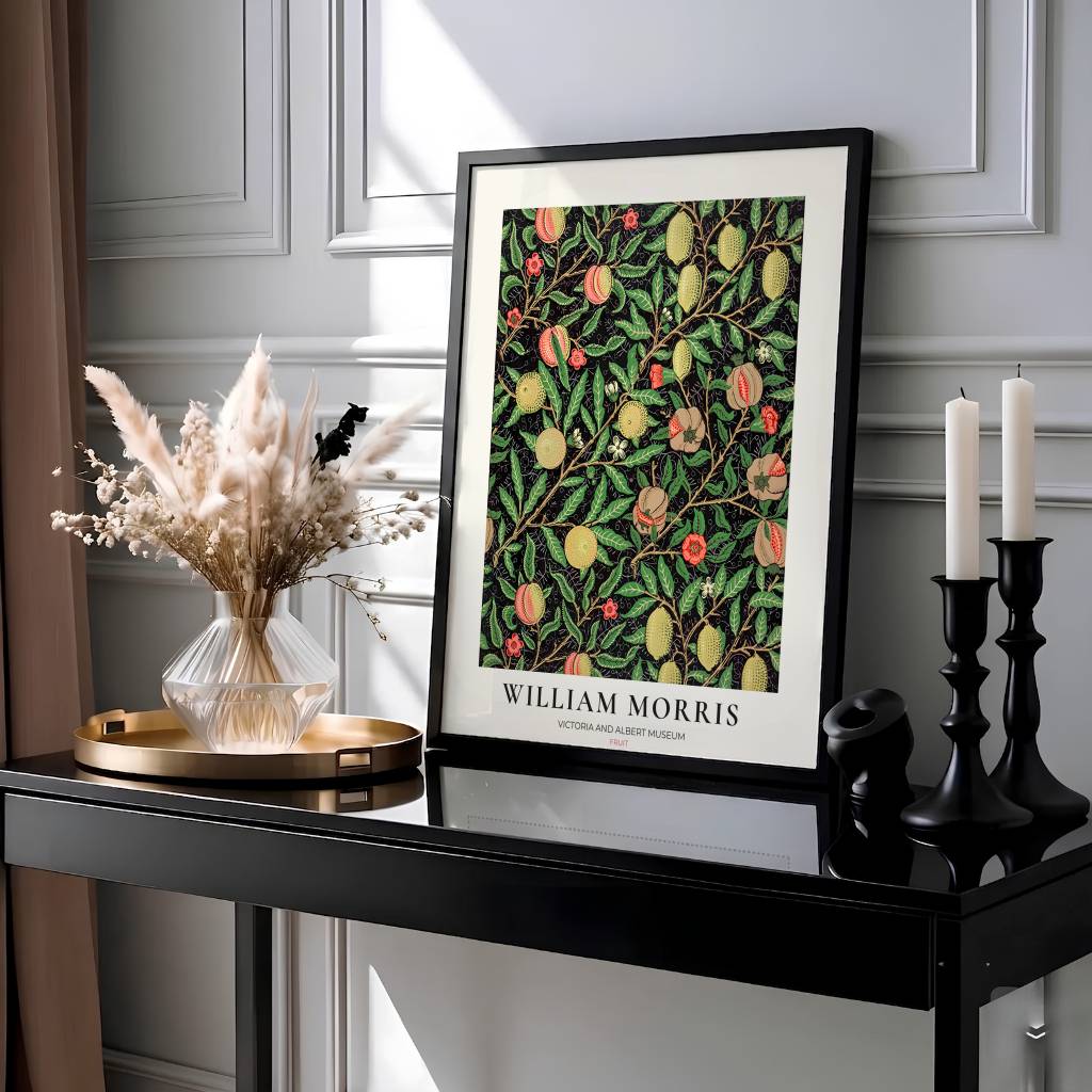 Moody Victorian kitchen decor print showing the famous 1862 William Morris Fruit pattern set against a high-contrast black backdrop.