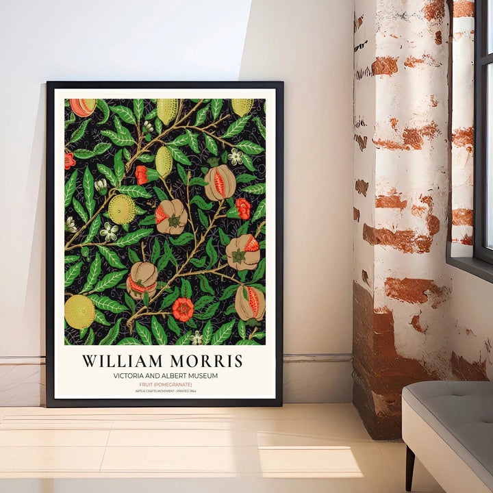 Detailed close-up of open pomegranates, citrus fruits, and red blossoms from the iconic William Morris Fruit Pomegranate exhibition poster.
