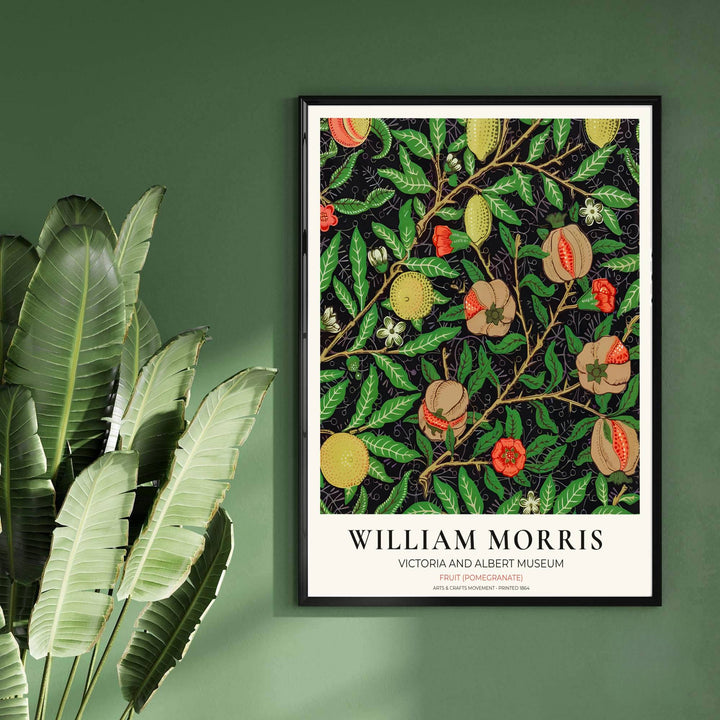Timeless Arts and Crafts Movement floral and fruit print by William Morris, adding moody historic charm and sharp color contrast to traditional home decor setups. MapYourDreams delivers framed, unframed, and canvas options available.