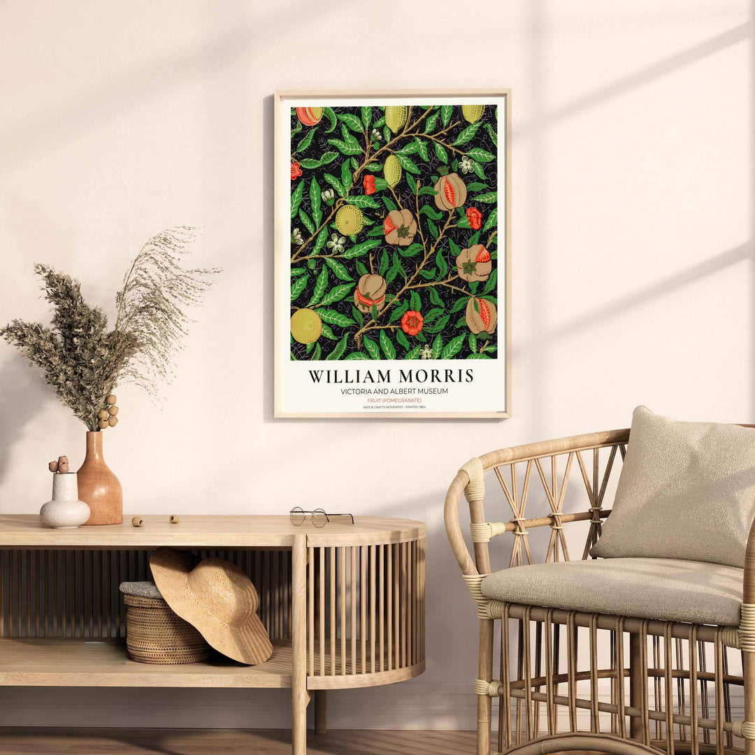 High-contrast dark botanical decor print featuring yellow citrus and open pomegranates by William Morris, framed in a clean cream exhibition layout. Order your favorite framed, unframed, and canvas options available at MapYourDreams.