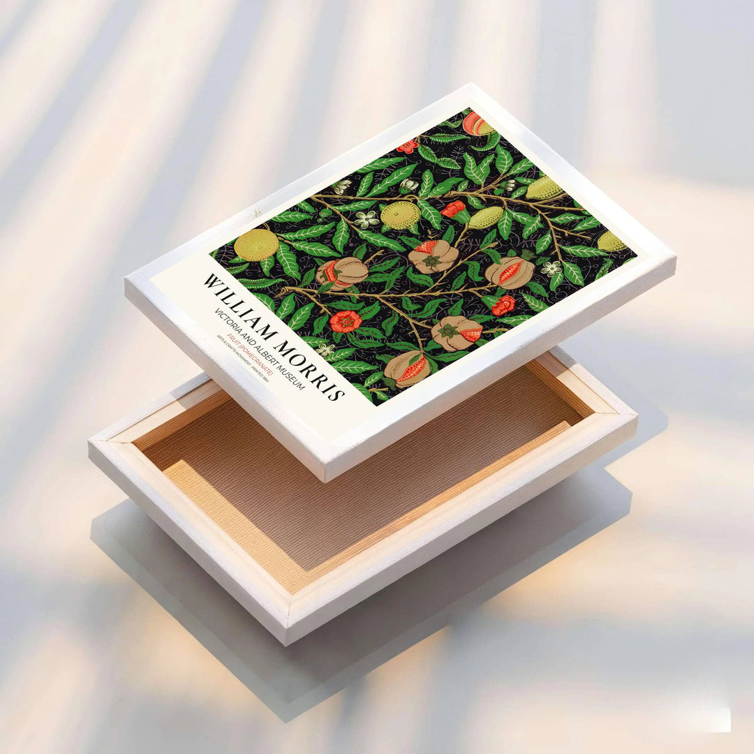 Striking citrus and pomegranate wall hanging featuring bright yellow William Morris lemons, green leaves, and red flowers from the Victoria and Albert Museum collection. Choose framed, unframed, and canvas options available from MapYourDreams.