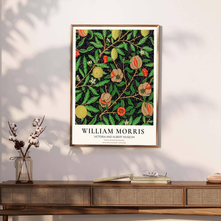 Symmetrical arrangement of hanging lemons, peaches, and open pomegranates by William Morris rendered in warm terracotta and yellow tones over a dark backdrop. Choose framed, unframed, and canvas options available at MapYourDreams.