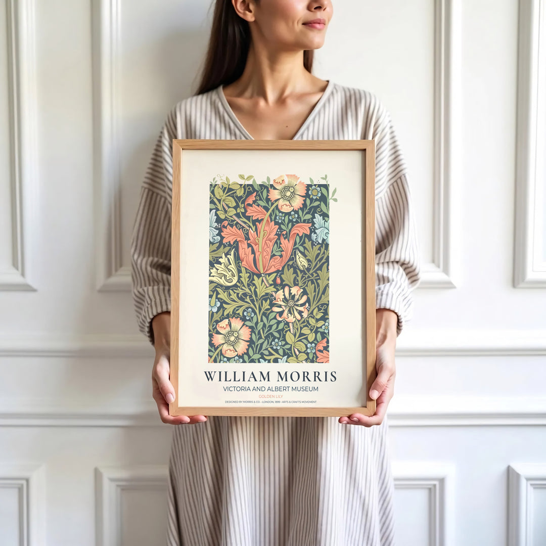 Romantic living room art print displaying the 1899 William Morris Golden Lily layout with peach pink and golden yellow accents. MapYourDreams has ready-to-hang framed, unframed, and canvas options available for decor.