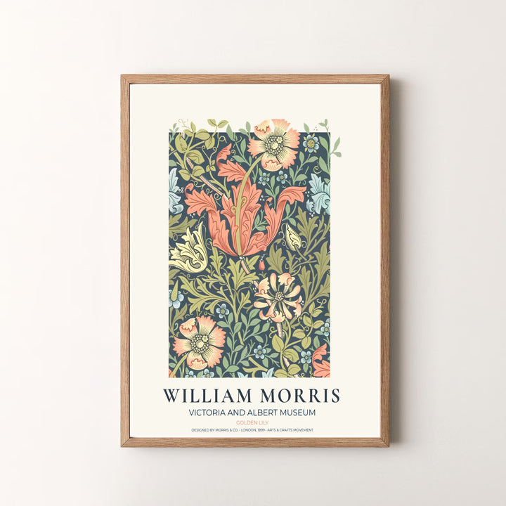 Vibrant botanical gallery wall piece featuring William Morris Golden Lily foliage rendered in soft peach pink and olive green tones. Shop versatile framed, unframed, and canvas options available at MapYourDreams.