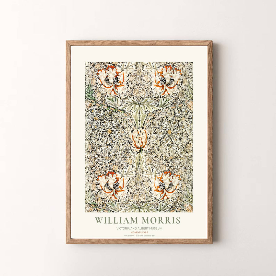 Vibrant botanical gallery wall piece featuring William Morris Honeysuckle foliage rendered in warm terracotta tones. Shop versatile framed, unframed, and canvas options available at MapYourDreams.