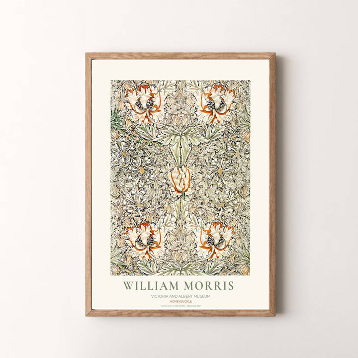 Vibrant botanical gallery wall piece featuring William Morris Honeysuckle foliage rendered in warm terracotta tones. Shop versatile framed, unframed, and canvas options available at MapYourDreams.