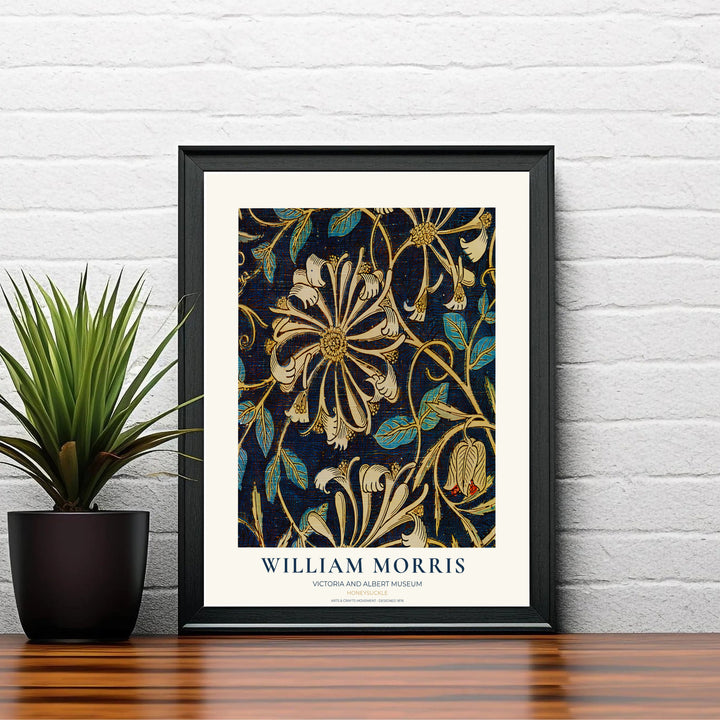 Deep navy blue and warm cream foliage in a restored vintage William Morris Honeysuckle exhibition print. MapYourDreams offers custom framed, unframed, and canvas options available for any room decor.