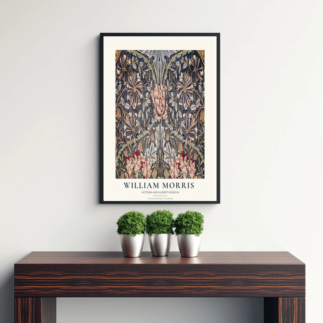 Elegant William Morris heritage wallpaper print showing slate blue and pink floral tendrils in a clean museum border. Explore durable framed, unframed, and canvas options available from MapYourDreams.