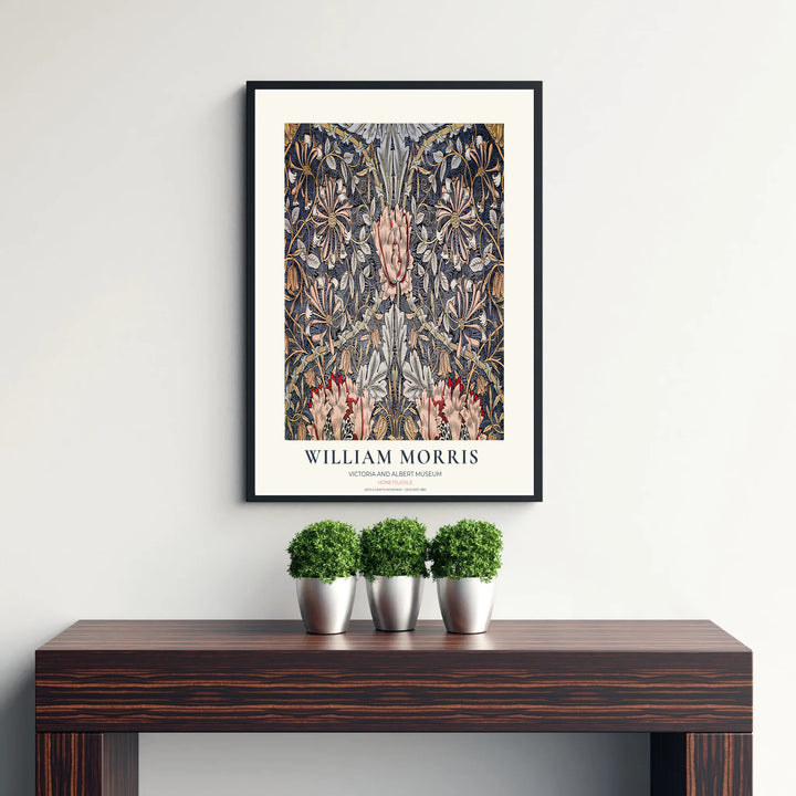 Elegant William Morris heritage wallpaper print showing slate blue and pink floral tendrils in a clean museum border. Explore durable framed, unframed, and canvas options available from MapYourDreams.
