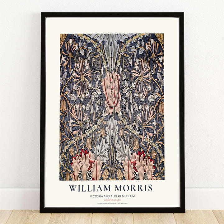 Soft pink honeysuckle blooms and silver-grey leaves over a dark slate background in a William Morris Honeysuckle print. MapYourDreams provides framed, unframed, and canvas options available for home interior decoration.