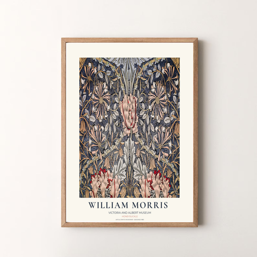 Vibrant dark botanical gallery wall piece featuring William Morris Honeysuckle foliage in slate blue and dusty pink. Shop versatile framed, unframed, and canvas options available at MapYourDreams.