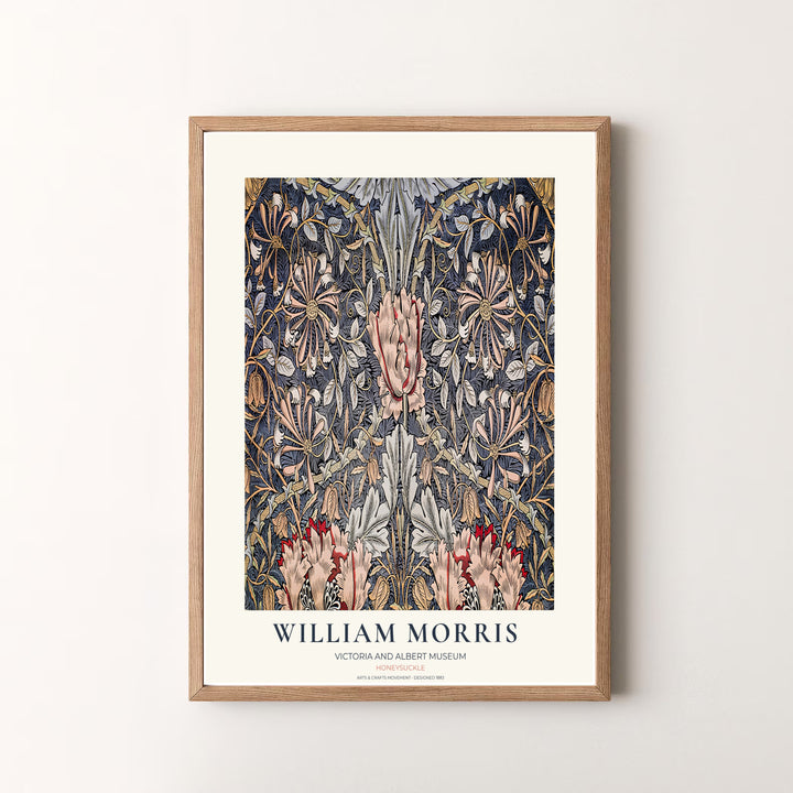 Vibrant dark botanical gallery wall piece featuring William Morris Honeysuckle foliage in slate blue and dusty pink. Shop versatile framed, unframed, and canvas options available at MapYourDreams.