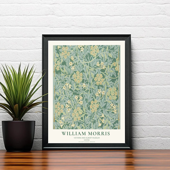 Winding golden stems and white jasmine blossoms by William Morris rendered over sage and forest green. Choose high quality framed, unframed, and canvas options available at MapYourDreams today.