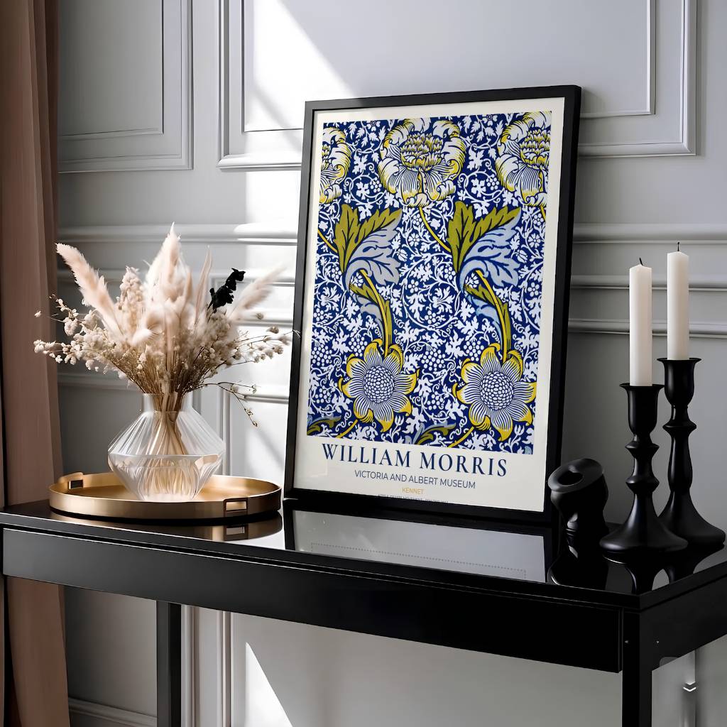 Close-up view of bright yellow sunflower petals, blue acanthus foliage, and white stems from the William Morris Kennet poster. MapYourDreams offers versatile framed, unframed, and canvas options available online.