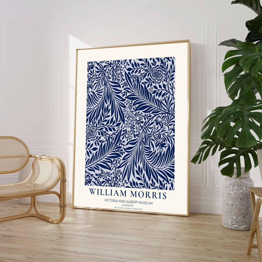 Bold navy and white botanical art poster by William Morris featuring Larkspur foliage, ideal for coastal living room spaces. Select from elegant framed, unframed, and canvas options available at MapYourDreams.