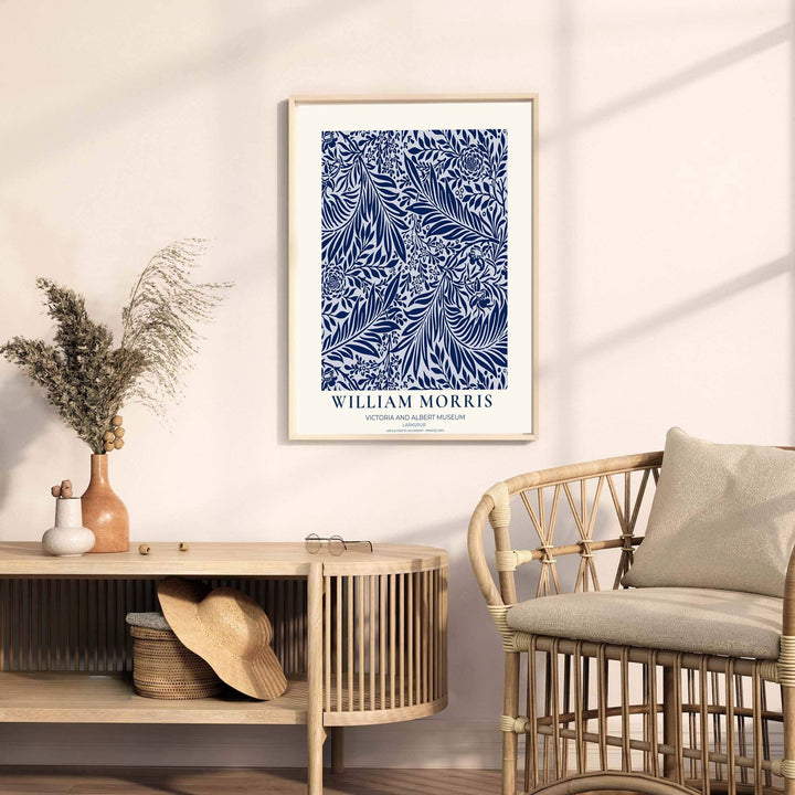 Detailed botanical illustration of navy larkspur flowers and willow leaves on sweeping vines by William Morris. MapYourDreams provides archival framed, unframed, and canvas options available to buy.
