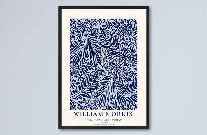 Vintage English heritage poster showing a dense navy tapestry of William Morris Larkspur vines on paper. Explore our selection of framed, unframed, and canvas options available at MapYourDreams.