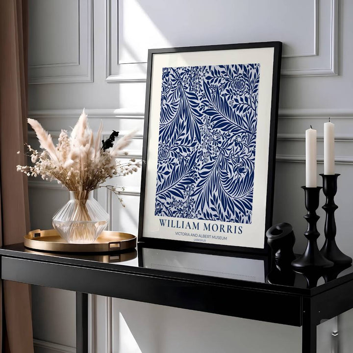 Intricate 1872 William Morris Larkspur wallpaper pattern in high-contrast navy and white with V&amp;A museum text. Shop high quality framed, unframed, and canvas options available today at MapYourDreams.