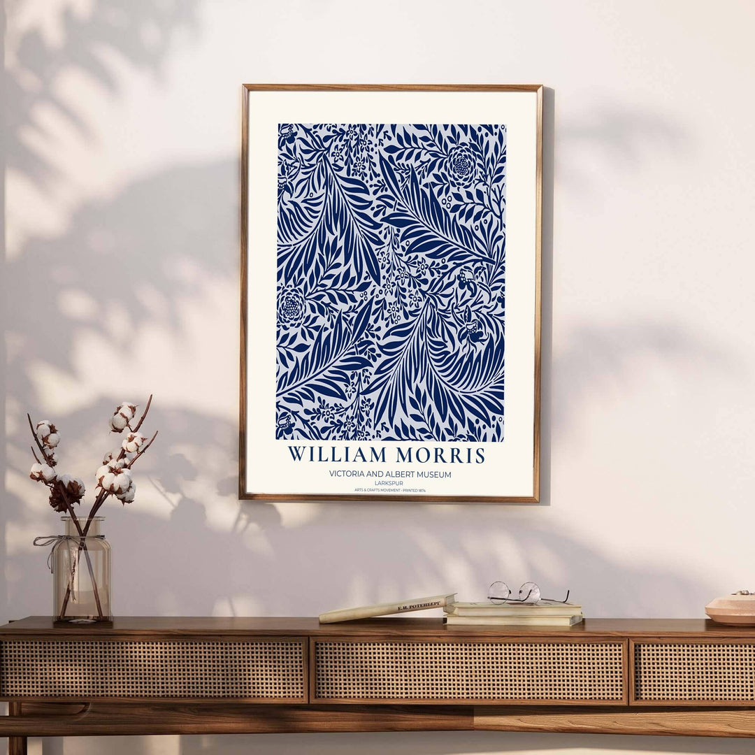 Archival exhibition poster of the navy William Morris Larkspur design with Victoria &amp; Albert Museum text. Discover our tailored framed, unframed, and canvas options available at MapYourDreams.