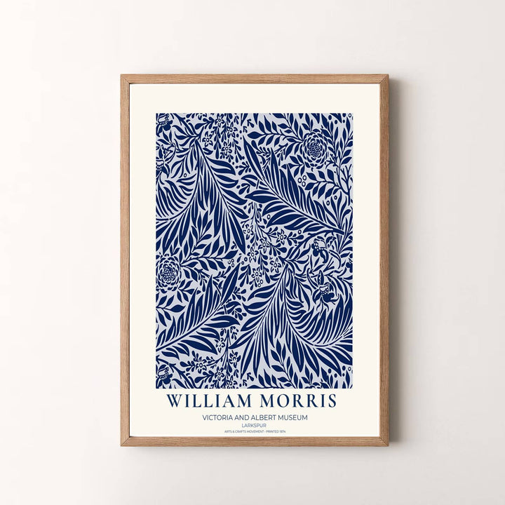 Vibrant botanical gallery wall piece featuring William Morris Larkspur foliage in navy blue and crisp white. Shop versatile framed, unframed, and canvas options available at MapYourDreams.