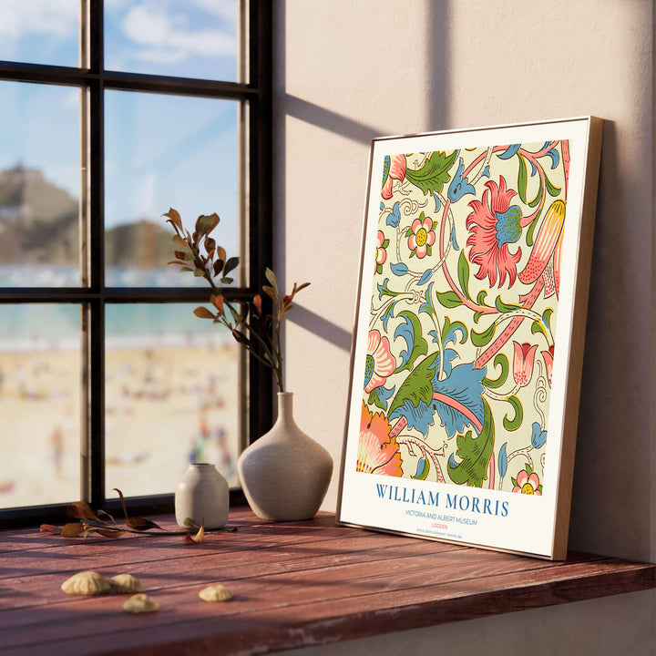Close-up view of coral pink petals, blue leaves, and small wild roses from the William Morris Lodden poster. MapYourDreams offers versatile framed, unframed, and canvas options available online.