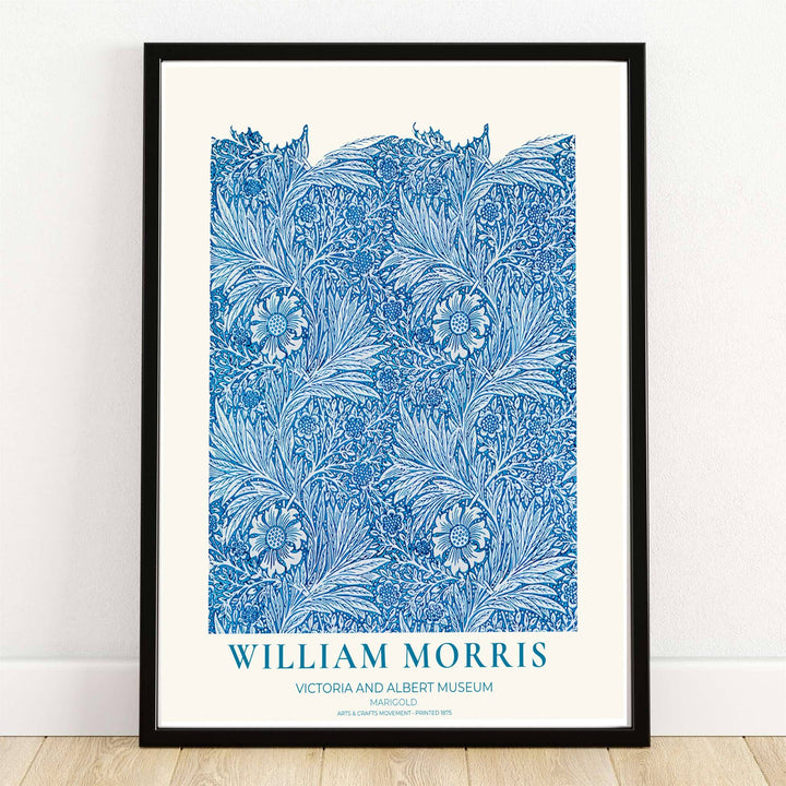 Swirling royal blue and cyan marigold blossoms over a soft cream background in a William Morris Marigold print. MapYourDreams provides framed, unframed, and canvas options available for home interior decoration.