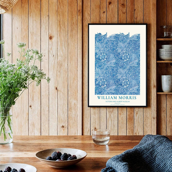 Winding cyan blue stems and marigold blooms by William Morris rendered in a vibrant botanical layout. Choose high quality framed, unframed, and canvas options available at MapYourDreams today.