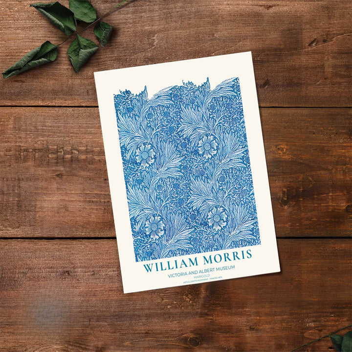 Vibrant blue cyan botanical decor print featuring Marigold foliage by William Morris, framed in a clean layout. Order your favorite framed, unframed, and canvas options available at MapYourDreams.