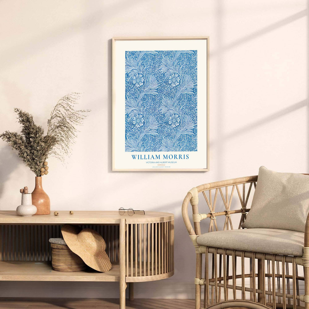 Detailed botanical illustration of blue marigold flowers and scrolling leaves on sweeping vines by William Morris. MapYourDreams provides archival framed, unframed, and canvas options available to buy.