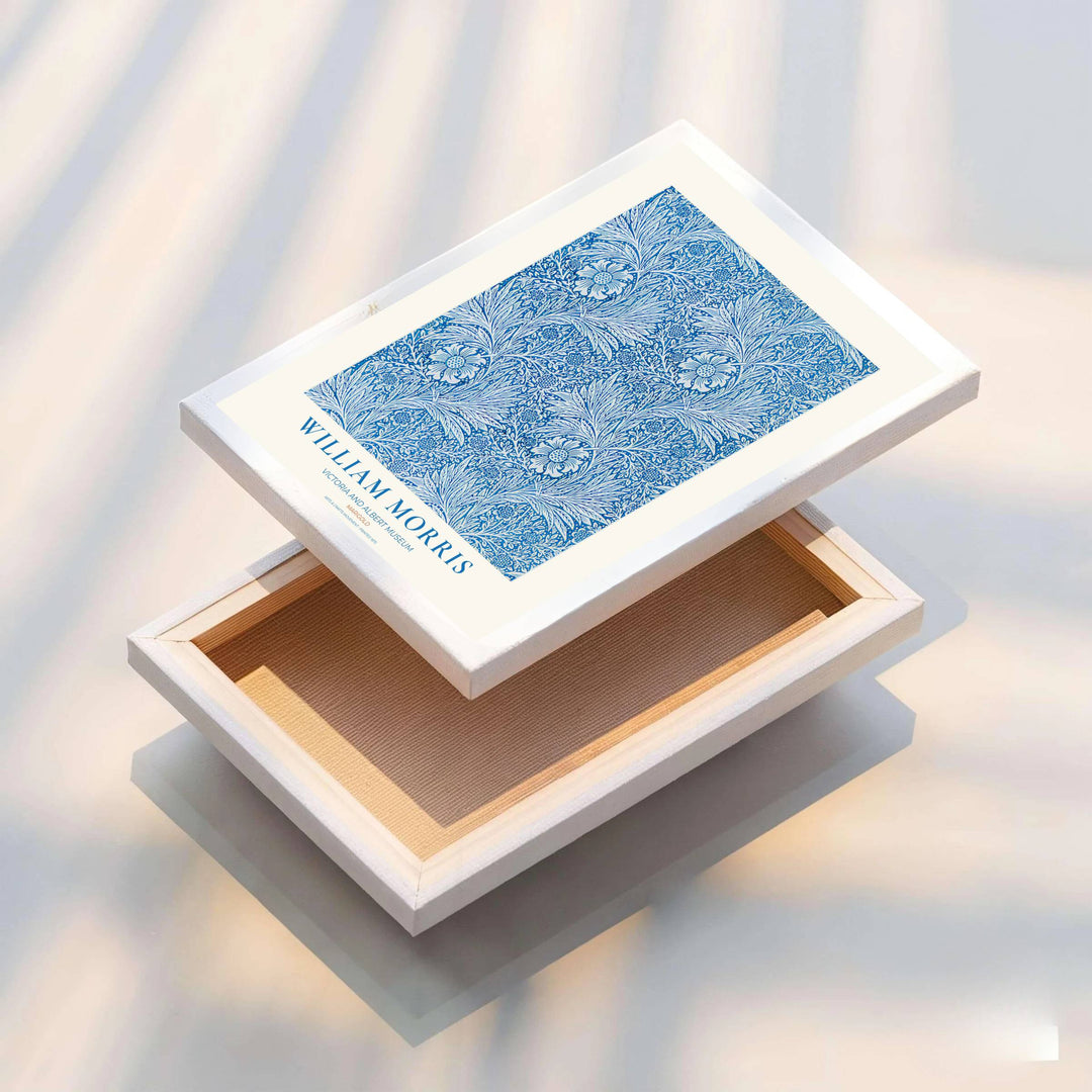 Striking blue white floral wall hanging featuring William Morris Marigold motifs from the V&amp;A museum collection. Choose framed, unframed, and canvas options available from MapYourDreams.