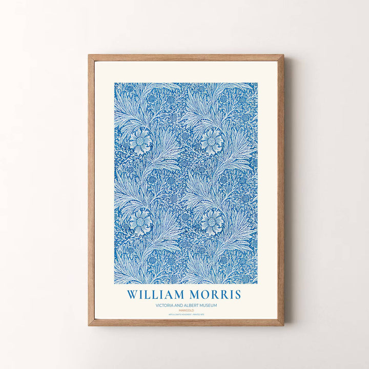 Vibrant botanical gallery wall piece featuring William Morris Marigold foliage in cobalt blue and white. Shop versatile framed, unframed, and canvas options available at MapYourDreams.