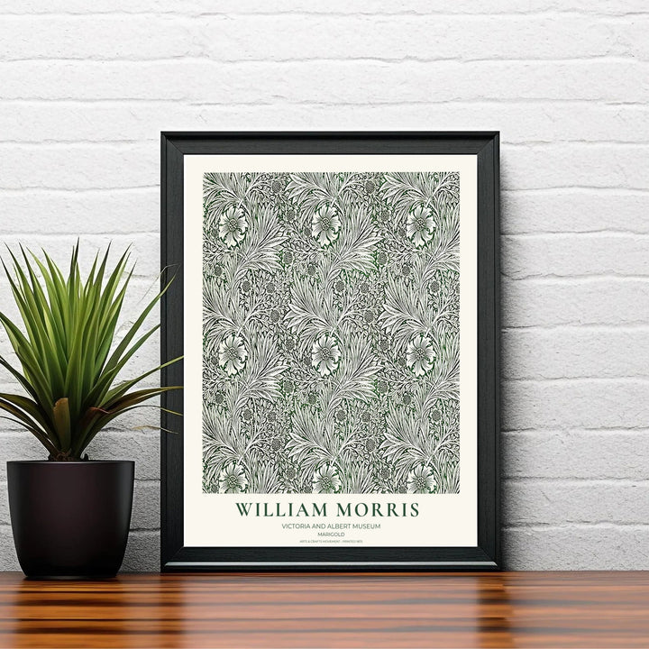 Winding cream stems and marigold blooms by William Morris rendered over olive green. Choose high quality framed, unframed, and canvas options available at MapYourDreams today.