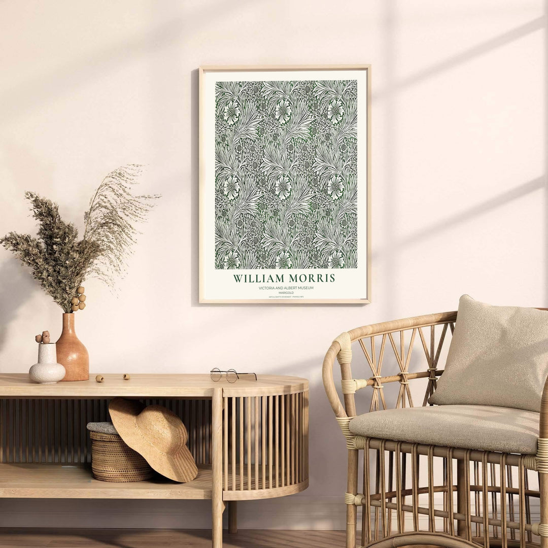 Detailed botanical illustration of cream marigold flowers and swirling leaves on sweeping vines by William Morris. MapYourDreams provides archival framed, unframed, and canvas options available to buy.