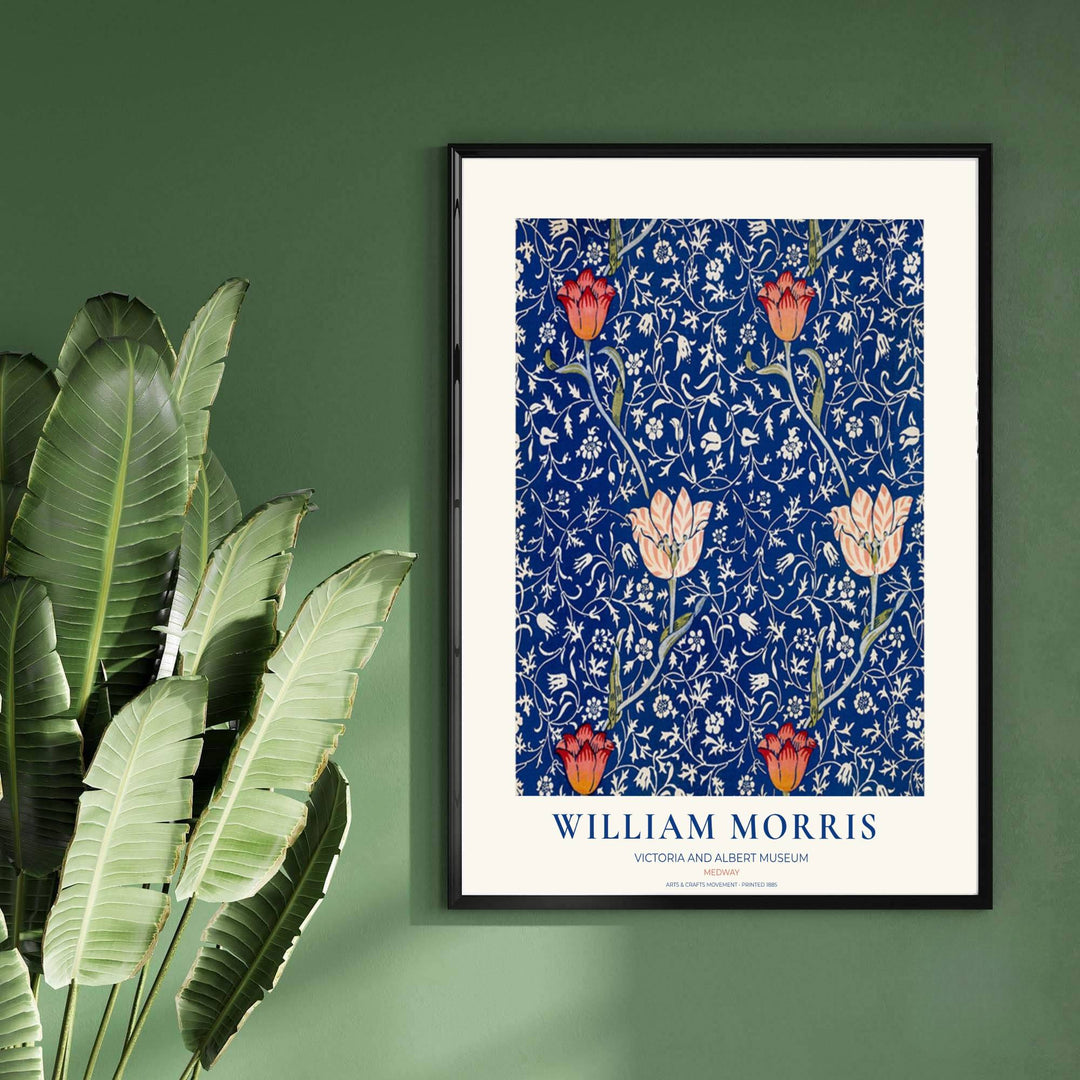 Classic William Morris textile design showing red tulips on dark blue in a museum border. MapYourDreams brings fine art framed, unframed, and canvas options available to elevate your bedroom or hallway gallery wall.