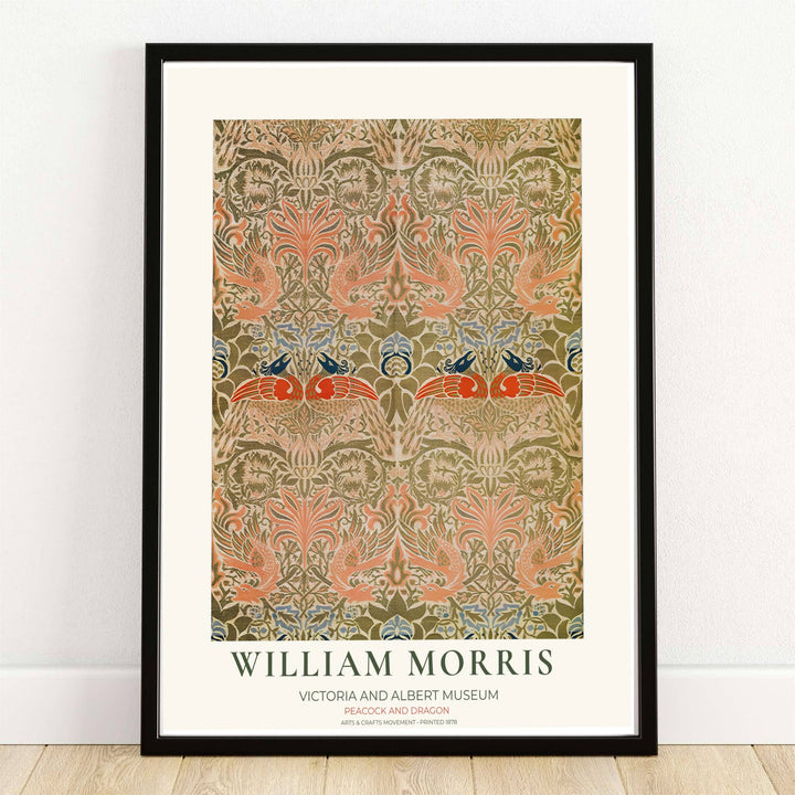Coral-colored peacocks and dark blue dragons rest inside an olive green leaf lattice in this William Morris wall poster. MapYourDreams supplies this vintage tapestry art in framed, unframed, and canvas options available for cottagecore interiors.
