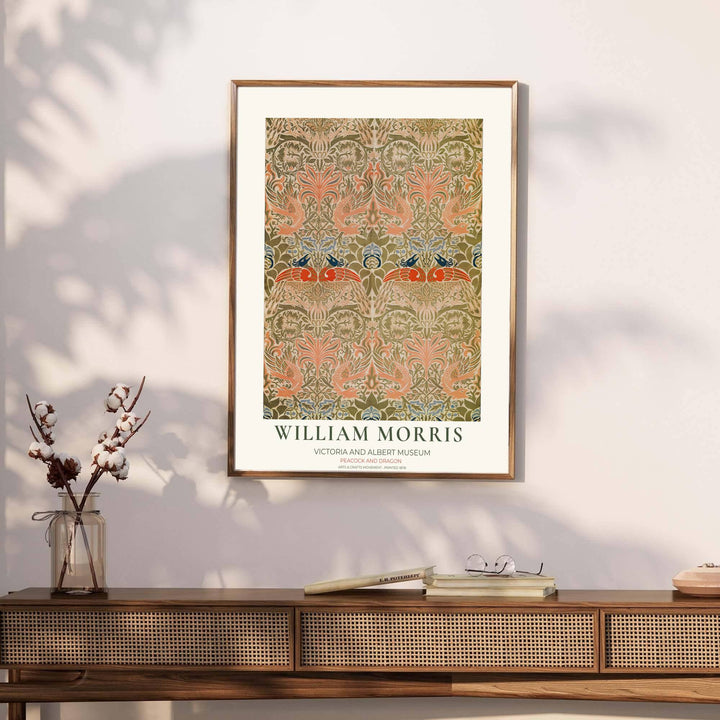 Authentic Victoria and Albert Museum typography frames this olive green and salmon pink bird pattern print. Pick high-contrast framed, unframed, and canvas options available at MapYourDreams for a refined art display.