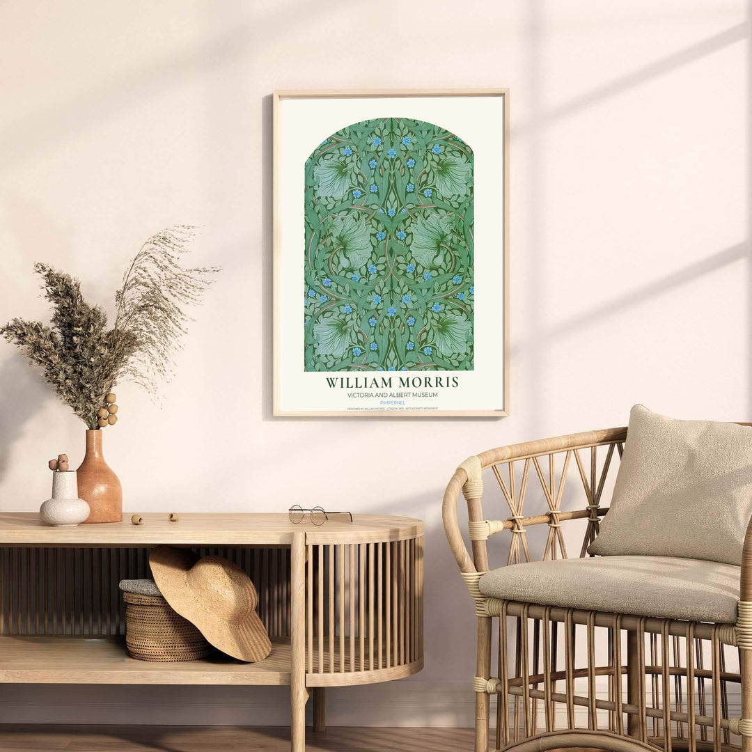 Gentle green leaves and blue flowers fill an arch in this restored William Morris Pimpernel wall art piece. Buy long-lasting framed, unframed, and canvas options available at MapYourDreams to expand your home art collection.