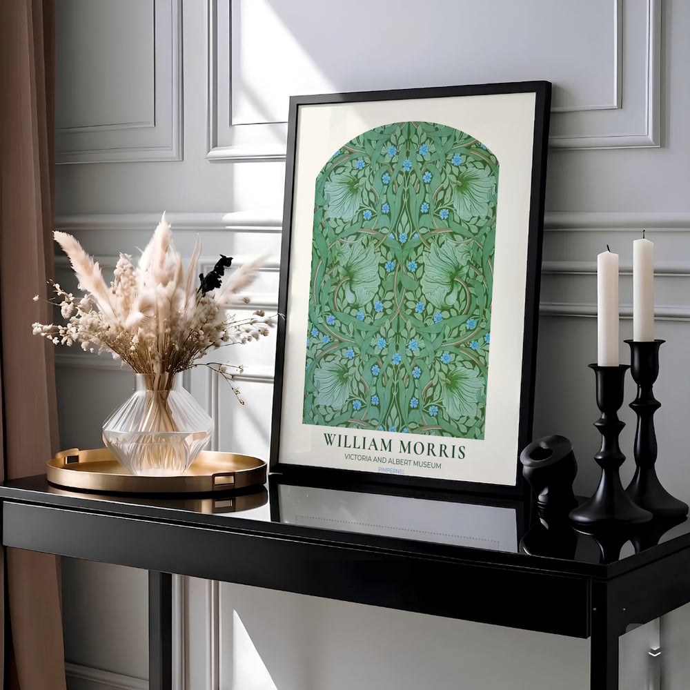 Tiny blue blossoms scatter across swirling green foliage in this 1876 William Morris Pimpernel poster. Discover high-quality framed, unframed, and canvas options available at MapYourDreams to style your living room gallery wall.