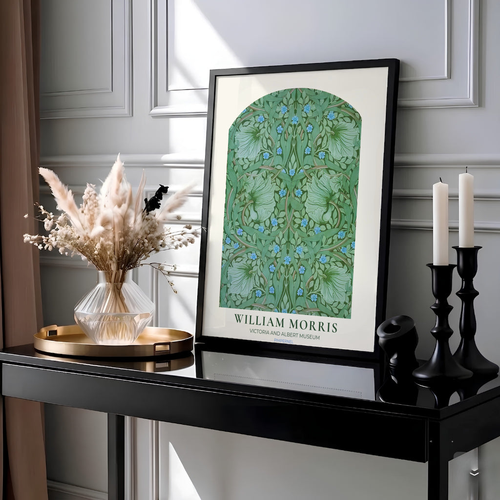 Tiny blue blossoms scatter across swirling green foliage in this 1876 William Morris Pimpernel poster. Discover high-quality framed, unframed, and canvas options available at MapYourDreams to style your living room gallery wall.