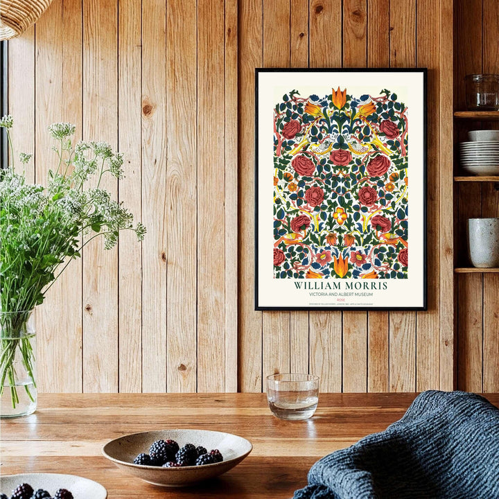 Romantic red flowers and bird illustrations define this William Morris Rose textile print. MapYourDreams offers fine art framed, unframed, and canvas options available to elevate reading nook gallery wall setups.