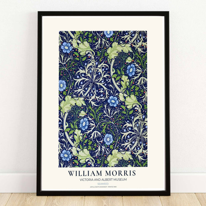 Pale green seaweed fronds and blue flowers swirl on cobalt in this William Morris Seaweed print. MapYourDreams supplies this vintage botanical artwork in framed, unframed, and canvas options available for coastal bathroom wall decor.