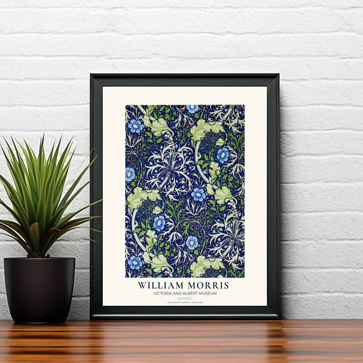 Swirling marine fronds drift across dark blue in this William Morris Seaweed art print. Discover ready-to-hang framed, unframed, and canvas options available at MapYourDreams for effortless room decoration.