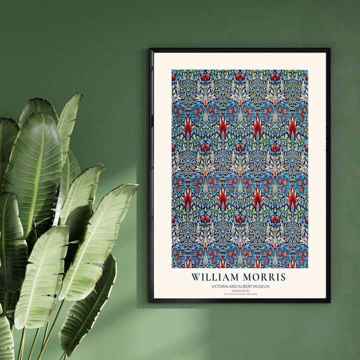 Rich navy blue and bright red shades combine in this timeless English William Morris Snakeshead print layout. Choose tailored framed, unframed, and canvas options available at MapYourDreams to complement wooden furniture.