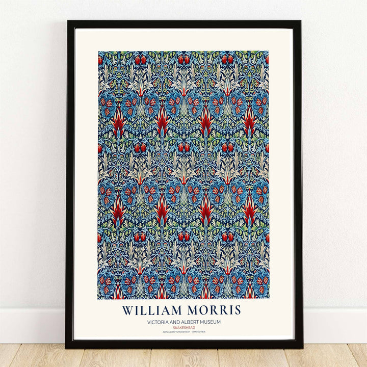 Flame red flowers and cream tendrils rest on dark indigo in this William Morris Snakeshead print. MapYourDreams supplies this vintage textile artwork in framed, unframed, and canvas options available for moody living room wall decor.