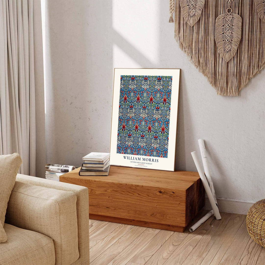 Deep indigo tones meet flame red petals in a sophisticated William Morris Snakeshead artwork print. MapYourDreams provides stylish framed, unframed, and canvas options available for designing dramatic living quarters.